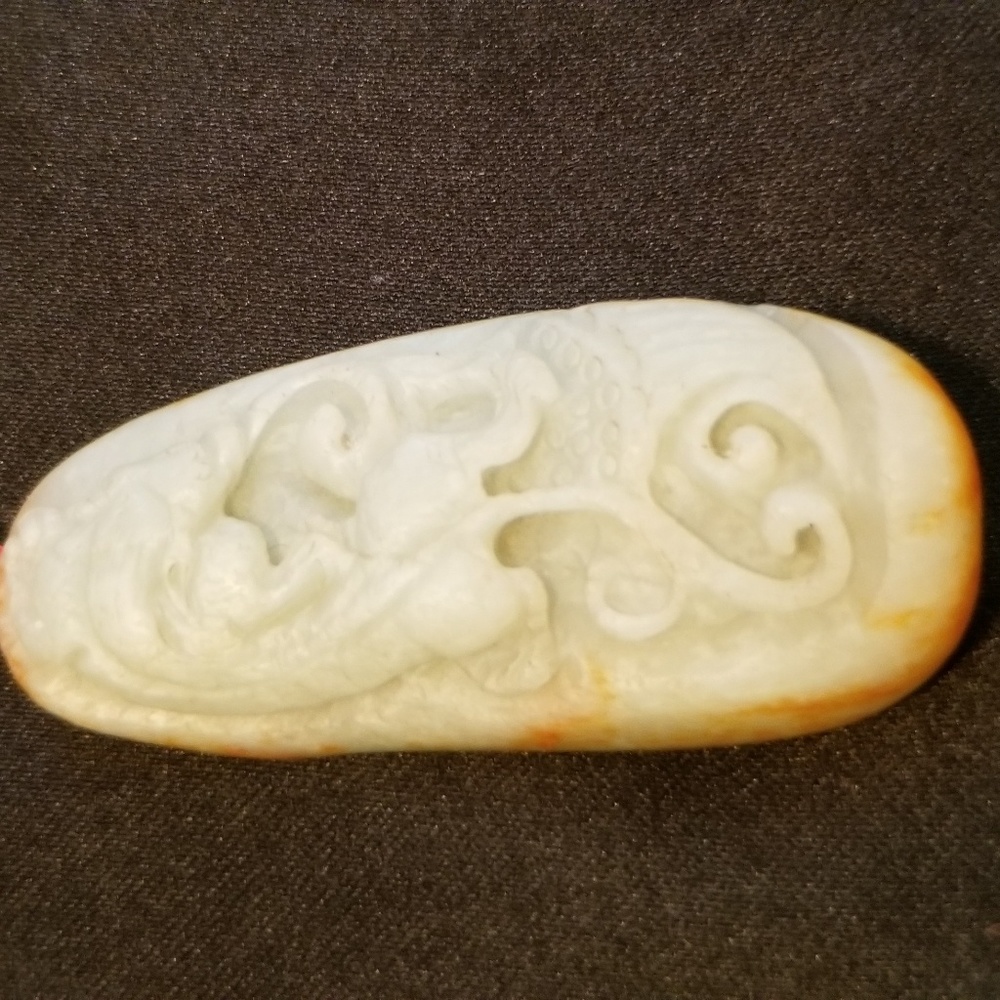 Hand carved jade tiger pendant